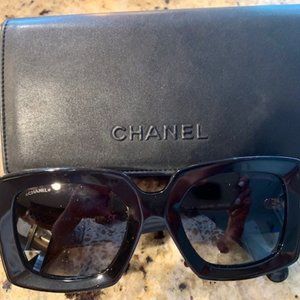 Chanel Sunglasses with clutch case.